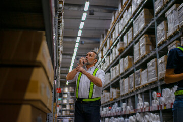 Logistics employees are working warehouse.
