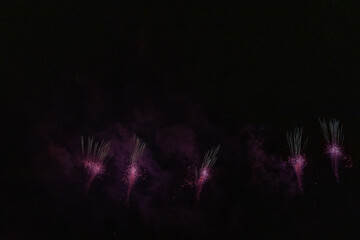 View of the music-synchronized fireworks display on the Rhine in Cologne with the Cologne Lights...