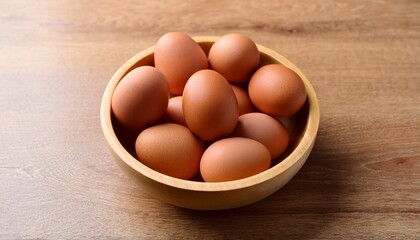 bowl of brown eggs on wooden table fresh food ingredient for healthy eating