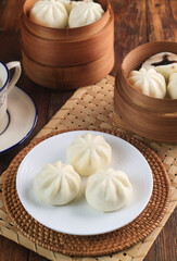 three pao on white plate 
