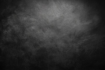 Dark gray textured surface with subtle highlights