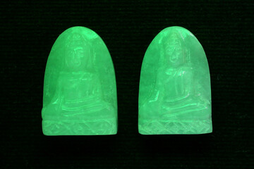 amulets of famous monks are believed in by many people in thailand.