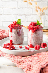 Homemade raspberry chia seed pudding on a serving plate