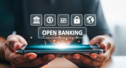 Person holding a smartphone displaying the concept of open banking with icons representing financial services, currency, api, security, and global connectivity