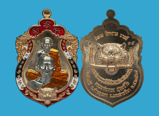 Amulets of famous monks and teachers at Wat Ban Rai, Thailand