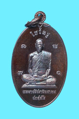 metal amulet coins worshipped by famous monks in thailand
