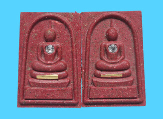amulets of famous monks are believed in by many people in thailand.