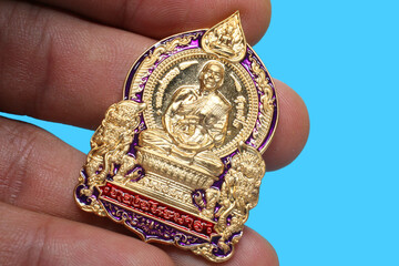 Amulets of famous monks and teachers at Wat Ban Rai, Thailand