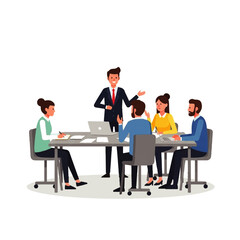 Obraz premium A confident businessman leads a productive team meeting, presenting ideas around a large table in a modern office.