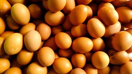 Piles of eggs displayed at a traditional market