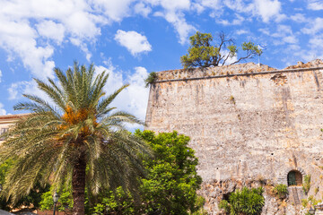 Ancient Venetian New Fortress walls in Corfu, Greece featuring weathered stone architecture with...