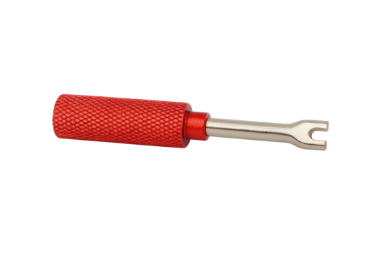 Photo of a tire valve core remover tool with a red textured handle and a silver metal end, isolated on a transparent background