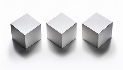 Fototapeta premium three white cubes are isolated on white background