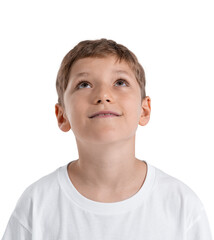 Isolated portrait of young boy child looking upward with curious