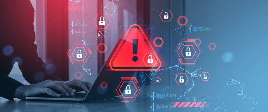 Cybersecurity breach warning concept with red alert symbols and padlocks over person typing on laptop in digital environment background.