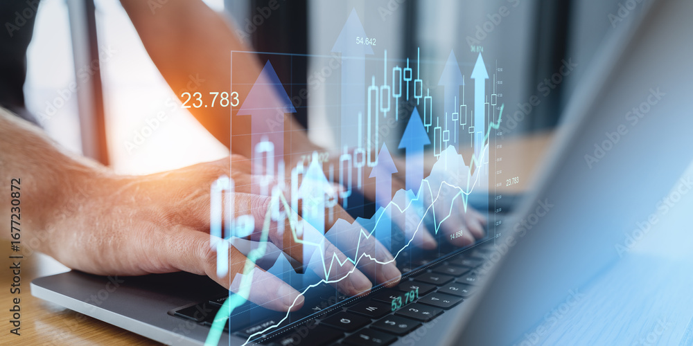 Poster hands typing on laptop with financial charts and arrows rising over interface.