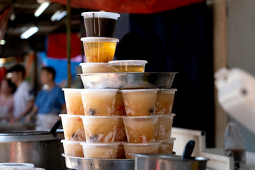 A delicious stack of assorted desserts arranged neatly, showcasing layers of sweetness, texture, and color in an appetizing presentation.