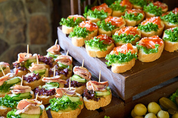 Deliciously arranged appetizers featuring fresh ingredients at a vibrant outdoor gathering during sunny daylight