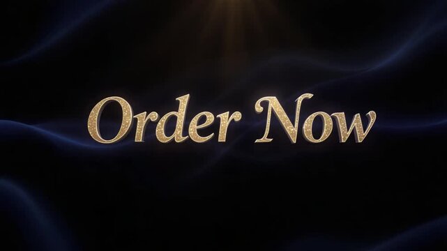 Elegant gold "Order Now" text on dark blue fabric background.