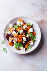 Salad with sweet potato, beetroot, feta and walnuts.