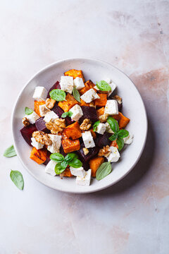 Salad with sweet potato, beetroot, feta and walnuts.
