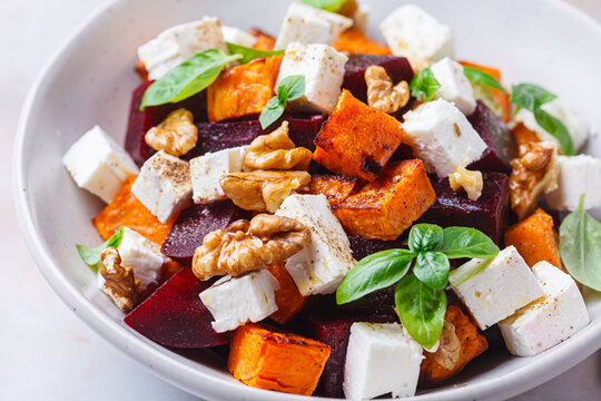 Salad with sweet potato, beetroot, feta and walnuts.
