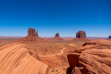 Stagecoach Formations and Solitary Road in Monument Valley