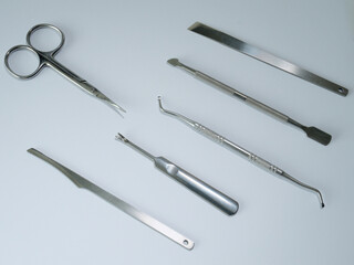 Manicure set tools neatly arranged in an organized layout.