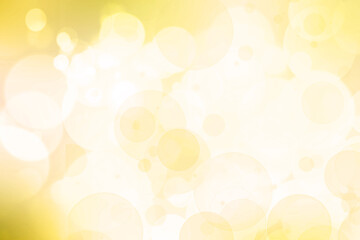 Abstract blurred fresh vivid spring summer light delicate pastel yellow white bokeh background texture with bright circular soft color lights. Beautiful backdrop illustration.