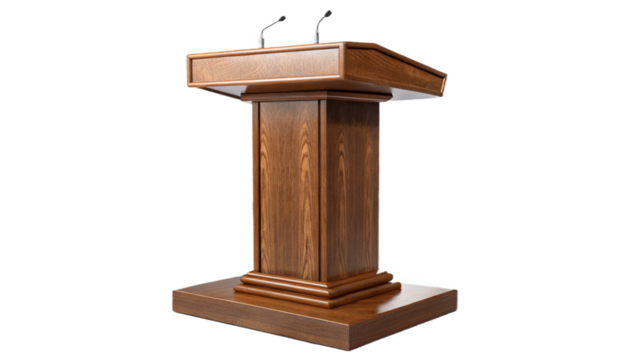 A wooden podium with two microphones standing against a black background in a studio setting
