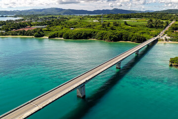Kouri Bridge Side Aerial View with Turquoise Sea in Okinawa, Japan (古宇利大橋・沖縄)