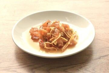 slick pickled rasidh with ginger and chili Chinese salad on plate
