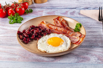 English breakfast with egg, bean and bacon