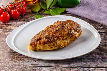 Baked chicken breast with spices and herbs