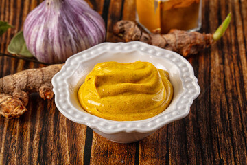 Indian yellow spicy curry sauce