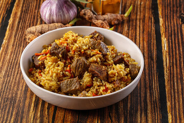 Asian traditional pilaf with beef