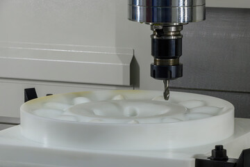 The CNC milling machine finish cut the plastic parts by solid ball nose end mill tool.
