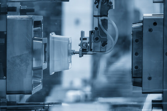 The food container production process by automatic system from plastic injection mold machine.