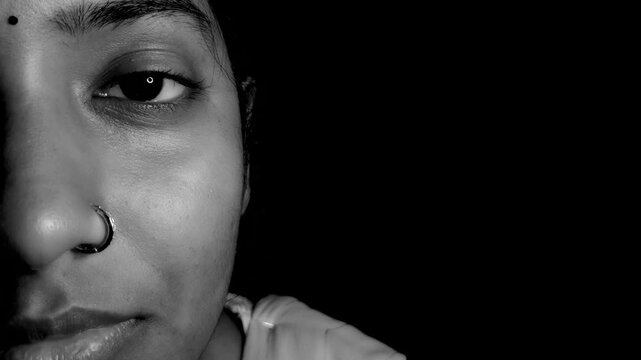 Emotional expression on face of young Indian teenage girl isolated