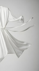 Flowing White Robe Elegantly Suspended in Air Studio Shot