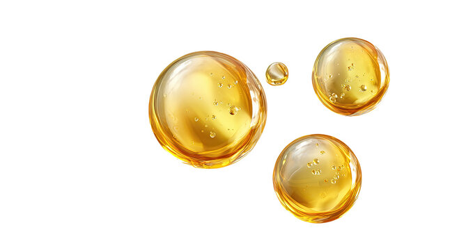 Three golden oil droplets on black background