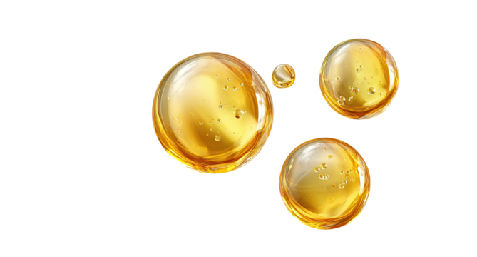 Three golden oil droplets on black background