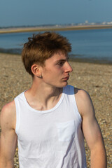 Teenage Boy Walking Beach
