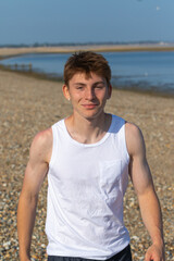 Teenage Boy Walking Beach