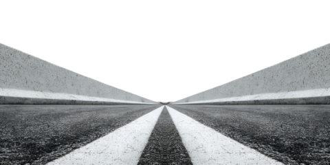 Empty road disappearing into darkness