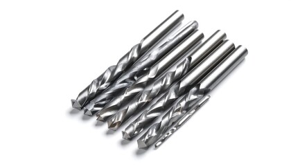 Fototapeta premium Various metal drill bits arranged in a setting against a plain white backdrop.
