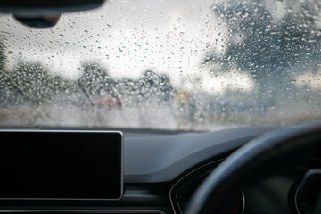 Rain on car windscreen bad weather