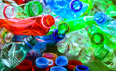 Empty colored drink bottles. Recyclable plastic waste