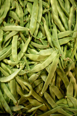 fresh green beans on a market