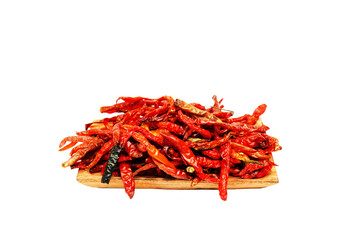 Dried chili pepper, chillies spicy served on wooden plate. Isolated on white background 